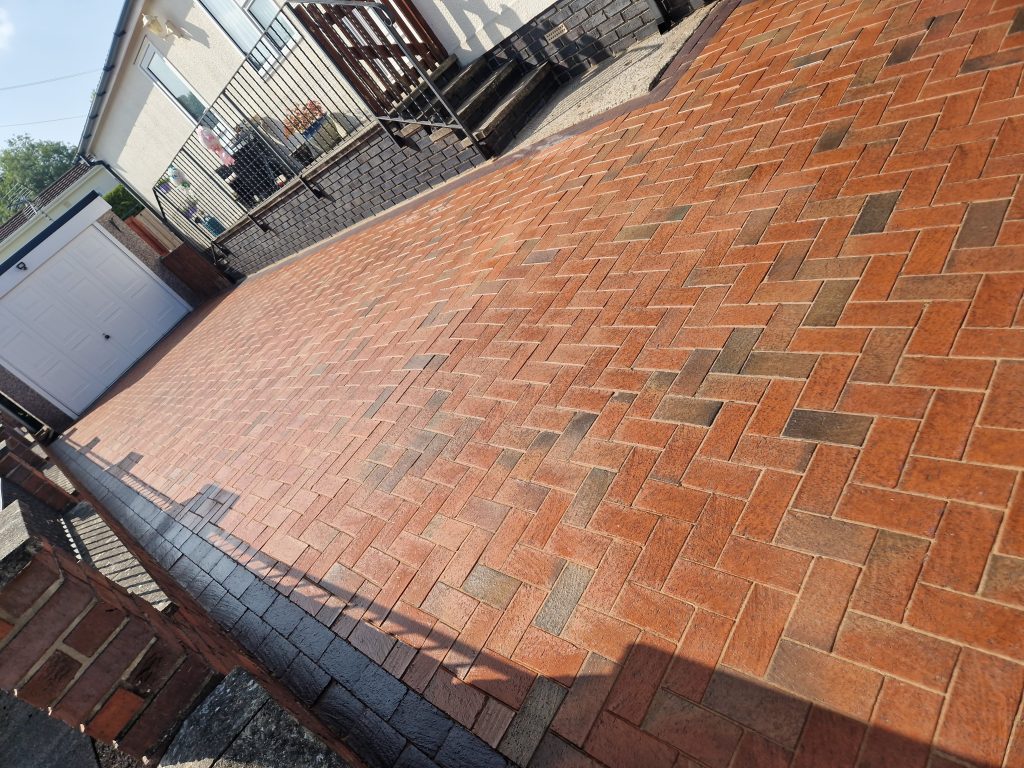 Freshly cleaned block paving driveway