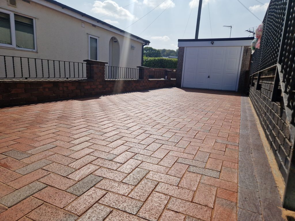 Block paving driveway before cleaning